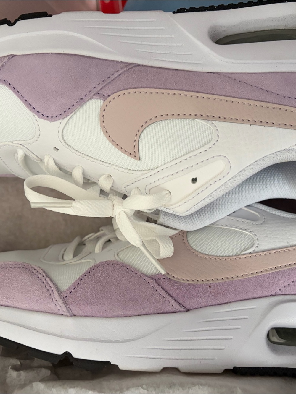 Nike White Sneakers with Light Pink and Lavender Accents